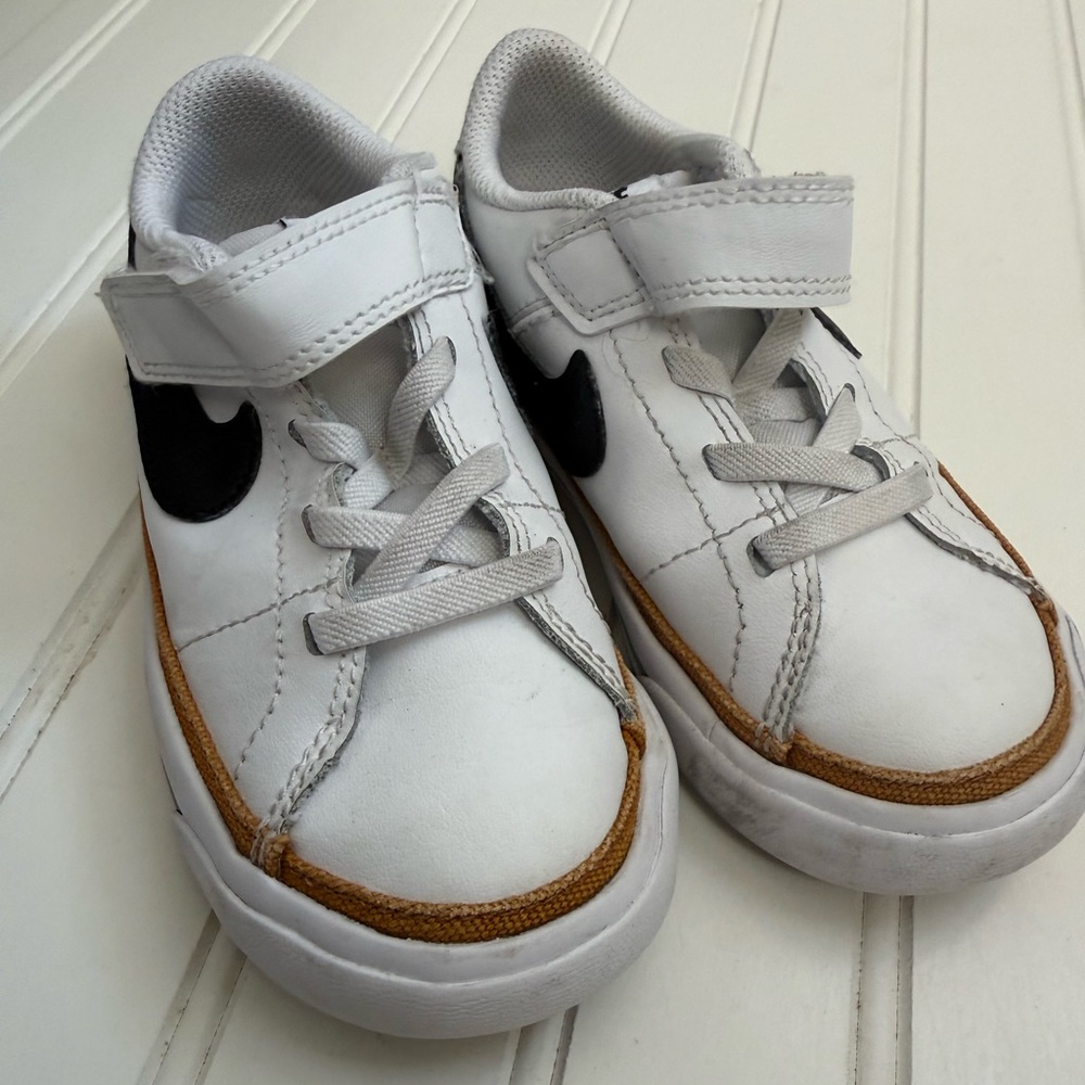 Nike Kids White Sneakers with Black Swoosh and Tan Trim
